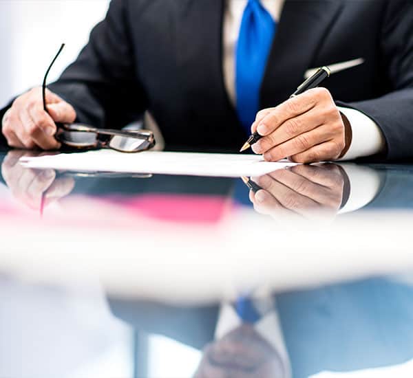 A Bluestein Attorney checks paperwork