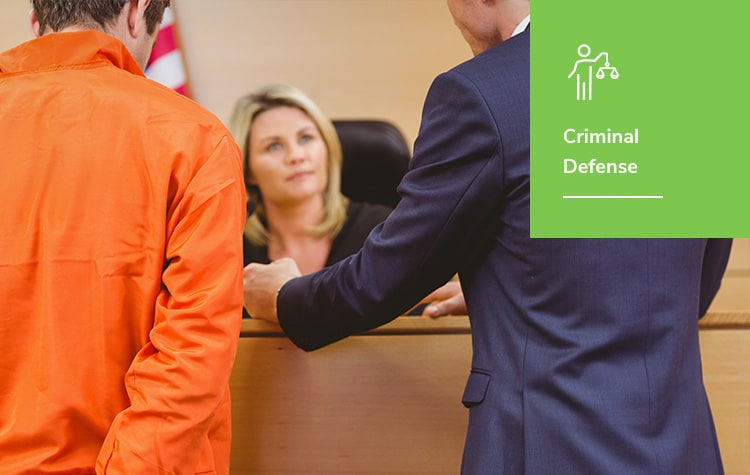 Criminal Defense - an attorney talks with a judge